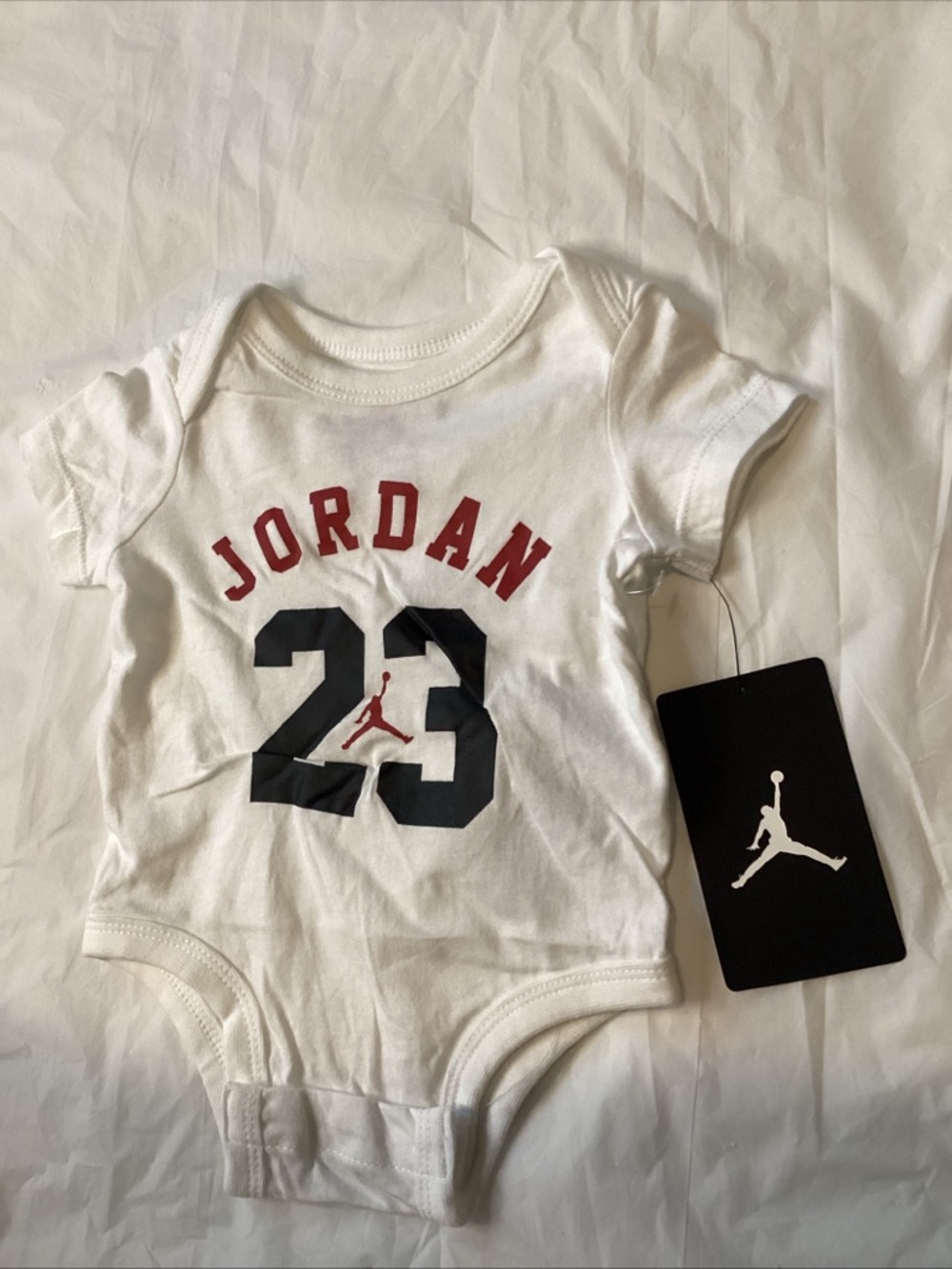 Jordan White Infant One-Piece with Red and Black Logo